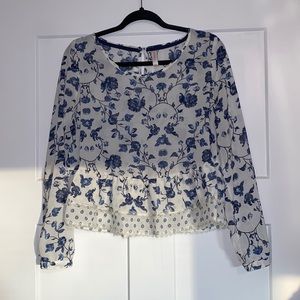 I got sleeve blouse with blue floral accents